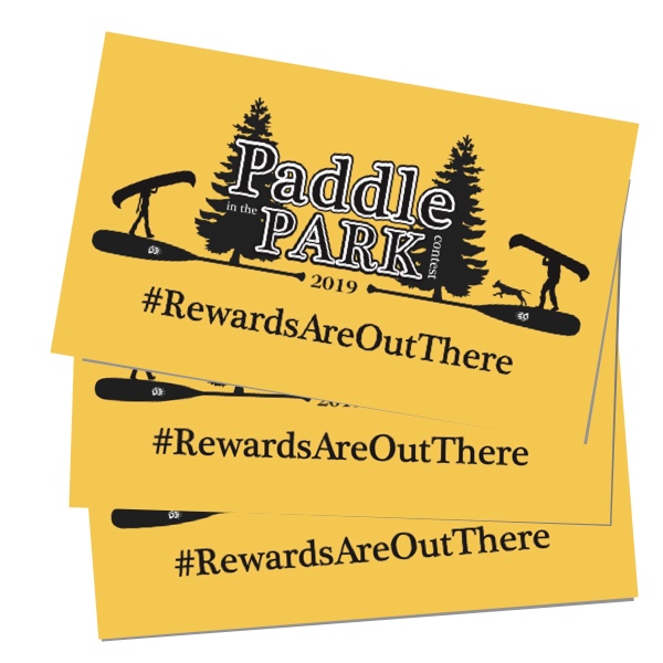 Paddle In The Park Contest Decal showing a man portaging a canoe with a dog and a woman portaging a canoe with trees and a logo