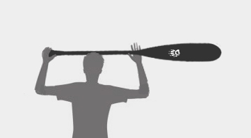 a male holding a canoe paddle above his head to demonstrate correct sizing