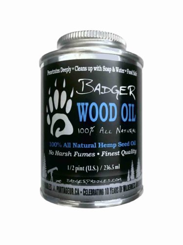 tin of 100% all natural hempseed oil with Badger Paddles and Portageur.ca anniversary labeling