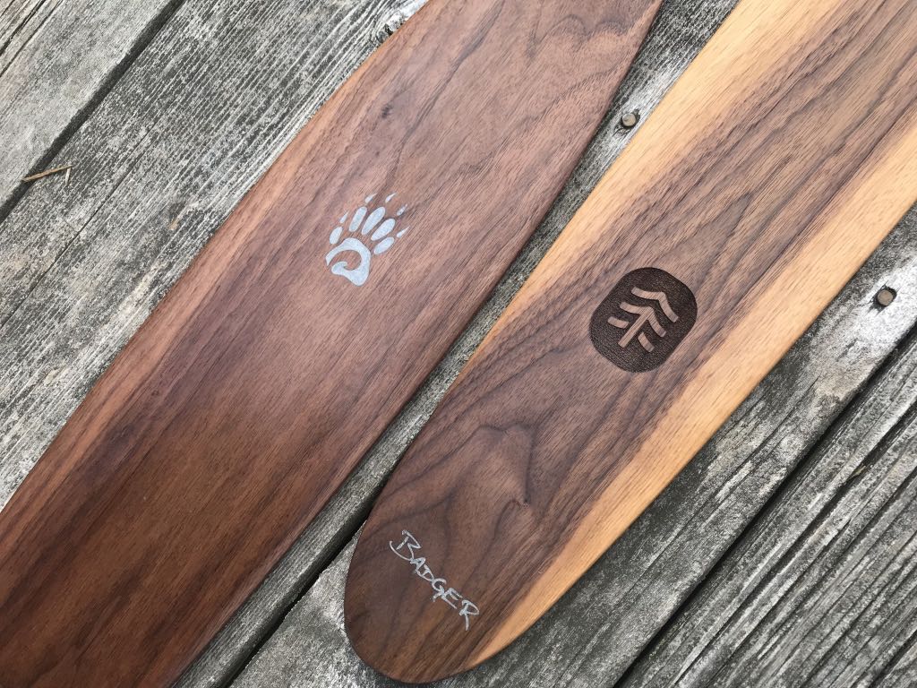 Special Edition Badger Walnut Canoe Paddles with aluminum inlay, laser engraved TreeEra logo - limited issue, on barnyard background