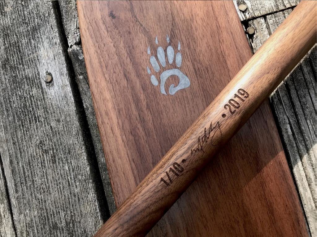 special edition limited issue badger anniversary package - featuring aluminum inlay on walnut canoe paddle with numbered signed and dated paddle shaft