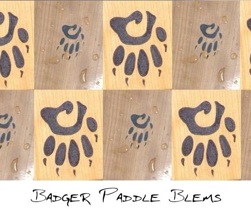Badger Paddle Blems: Small and big upside down Badger paw logos in a pattern using an image grid.