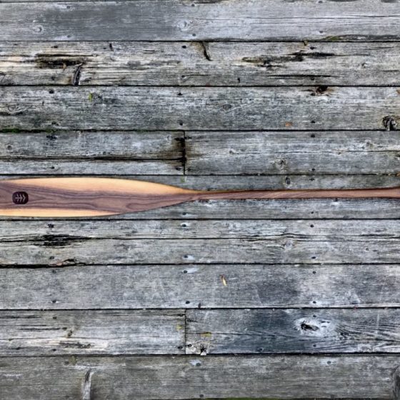 Special Edition Walnut Sliver Canoe Paddle on barn board background
