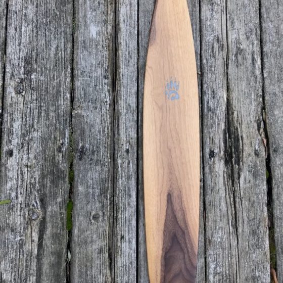 Special Edition Walnut Sliver Canoe Paddle on barn board background - blade