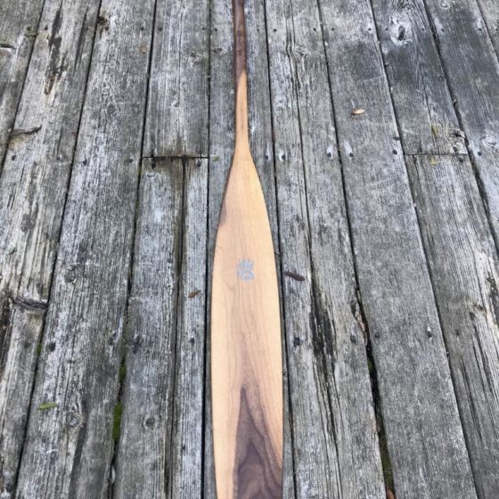 Special Edition Walnut Sliver Canoe Paddle on barn board background