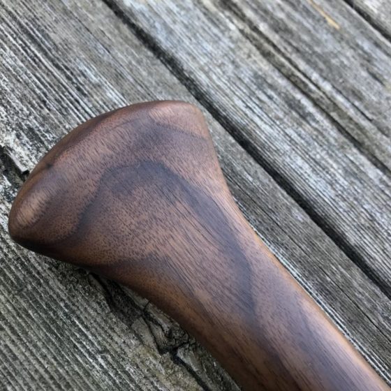 Special Edition Walnut Sliver Canoe Paddle on barn board background - Grip