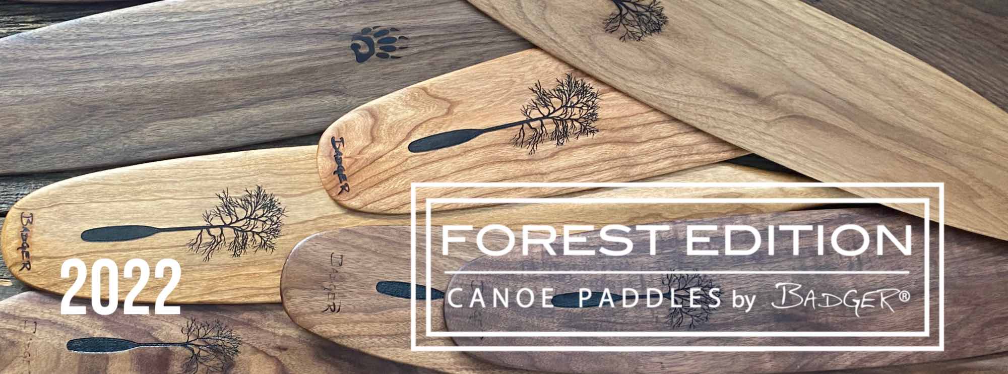 Collection of various cherry and walnut Forest Edition Canoe Paddles by Badger®